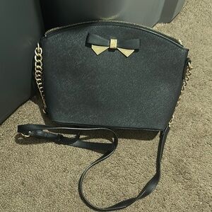 Anne Klein Black and Gold Crossbody Bag with Bow Accent